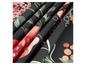 Zwarte stof met roze en groene bloemenprint.