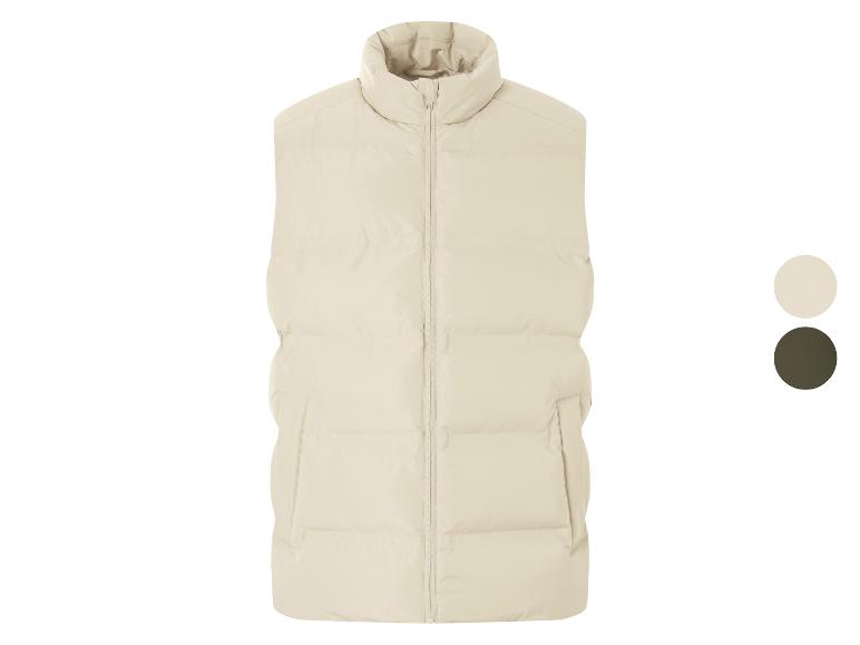 Beige gewatteerd vest met rits en twee kleurstalen.