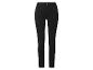 Zwarte damesjeans met hoge taille en smalle pijpen.