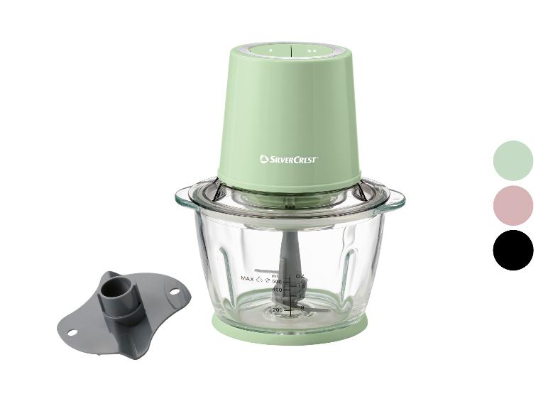 Mintgroene elektrische hakmolen met glazen kom en accessoires, met kleurstalen.