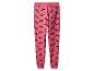 Roze joggingbroek met kerstpatroon van teckels en bomen.