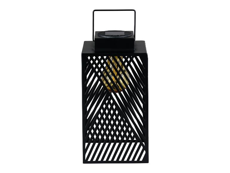 Zwarte solar lampion met geometrisch patroon, ingebouwde LED verlichting.