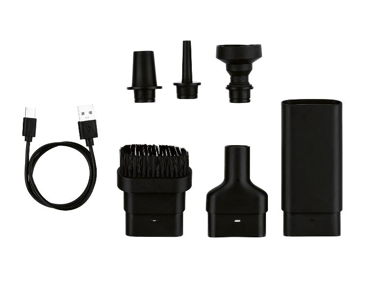 Set van zwarte stofzuigeropzetstukken en een USB-oplaadkabel