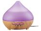 Paarse aroma diffuser met houtlook basis en knoppen voor timer en licht.