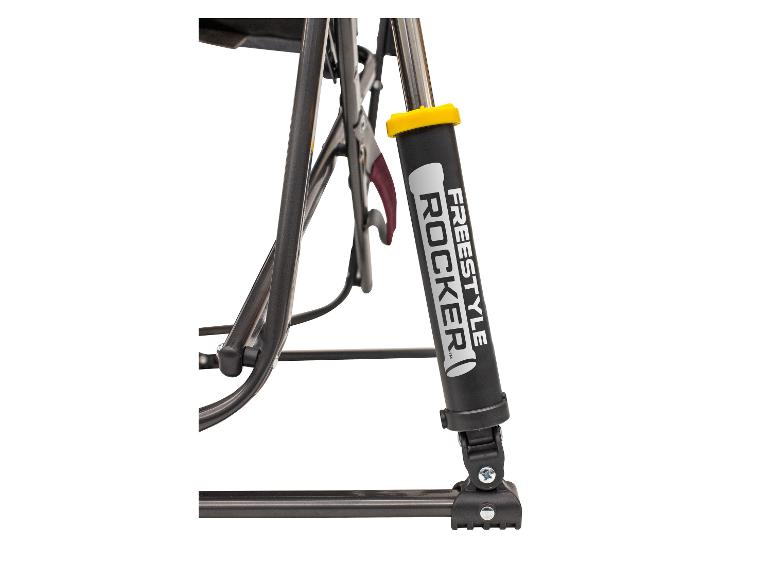 Close-up van een zwarte Freestyle Rocker stoel met een gele veer.