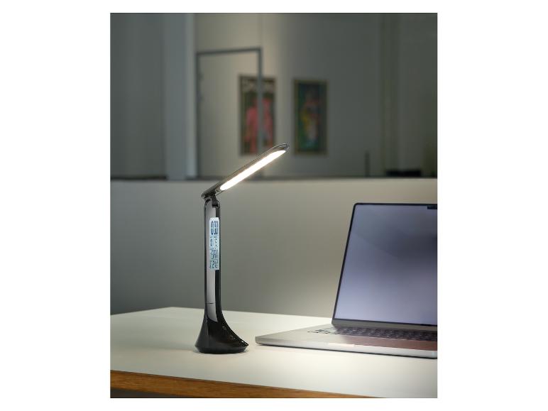LED bureaulamp met klok en laptop.