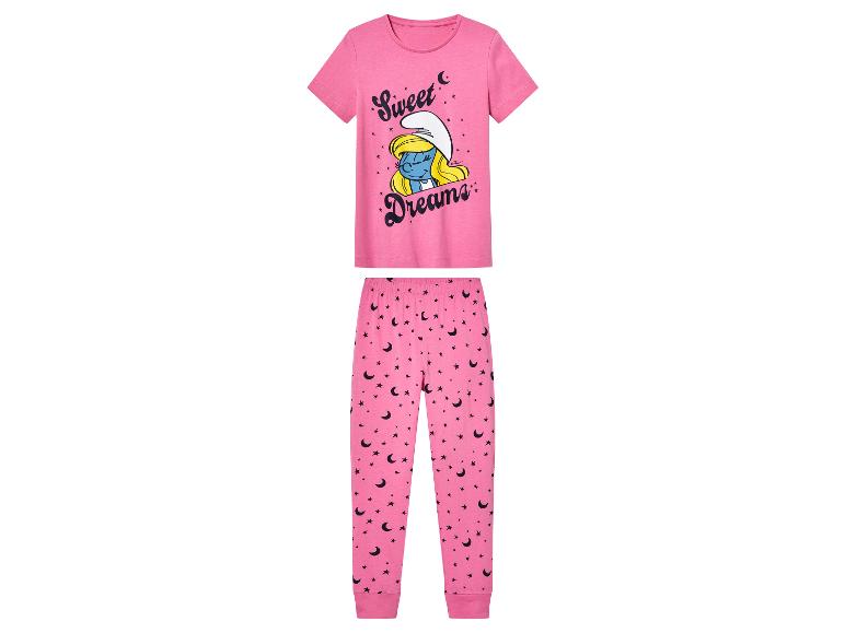 Een roze pyjama met Smurfin erop en een sterren- en maansieraad.