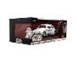 Star Wars R2-D2 figuur en 1959 Volkswagen Drag Beetle speelgoedauto in een displaydoos.