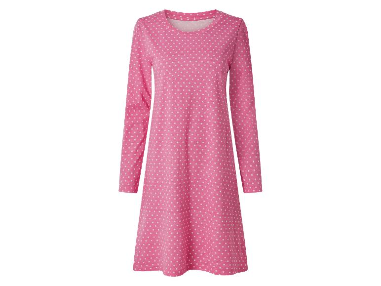 Roze jurk met lange mouwen en witte stippen.