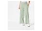 Vrouwelijke broek met wijde pijpen in lichtgroen