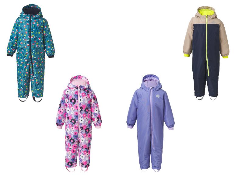 Vier kinder skipakken: twee met patroon (vossen, bloemen) en twee effen (blauw/beige, paars).