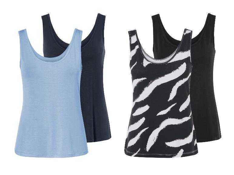 Twee effen en twee zebraprint tanktops.