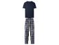 Herenpyjama met een marineblauw T-shirt en geruite broek.
