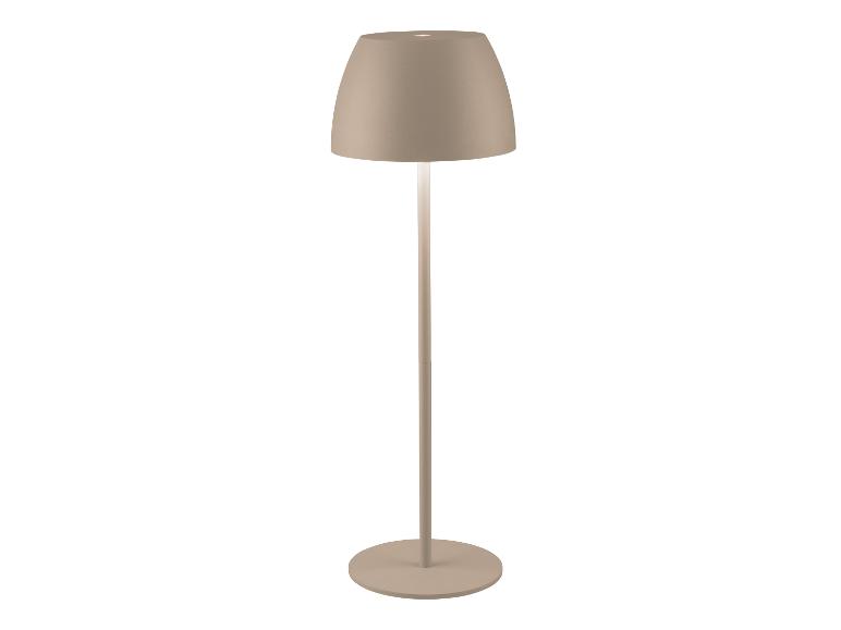 Beige vloerlamp met een klokvormige kap en een ronde voet.