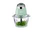 Groene SilverCrest keukenmachine met gehakte kruiden.