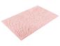 Lichtroze badmat, zachte textuur.