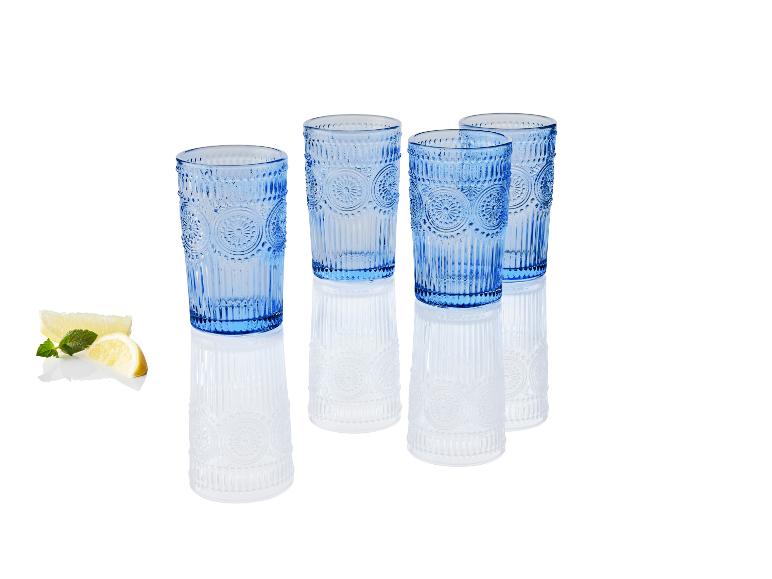Set van vier blauwe glazen met vintage design.