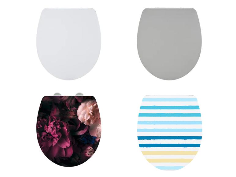 Toiletbrillen: wit, grijs, bloemenprint en strepen.
