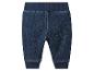 Donkerblauwe denim babybroek met elastische tailleband en boorden.