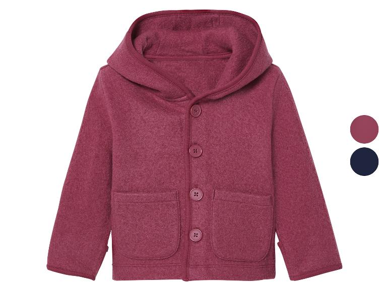 Roze fleece jas met capuchon voor kinderen.
