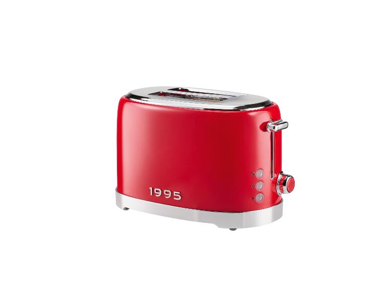 Een rode retro-toaster uit de jaren 90.