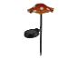 Een op zonne-energie werkende paddestoelvormige tuinlamp.