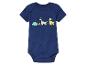 Een donkerblauwe baby romper met dinosaurussen erop.