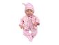 Babypop met een roze bloemenpyjama en een gewatteerd roze jasje met bijpassende muts