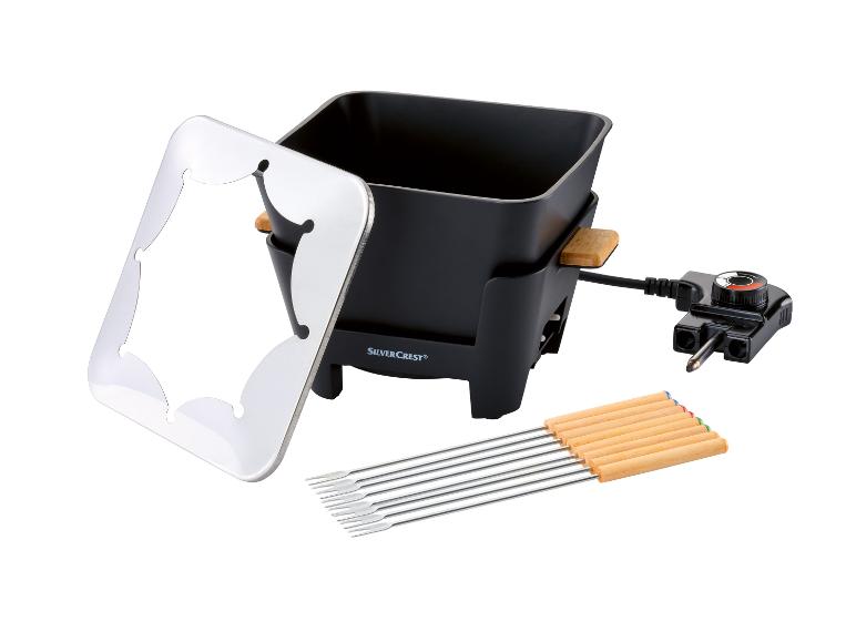 Fonduese  met 8 vorken van Silvercrest.