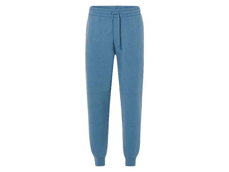 Blauwe joggingbroek met trekkoord.