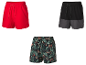 Drie heren shorts in verschillende kleuren en patronen.