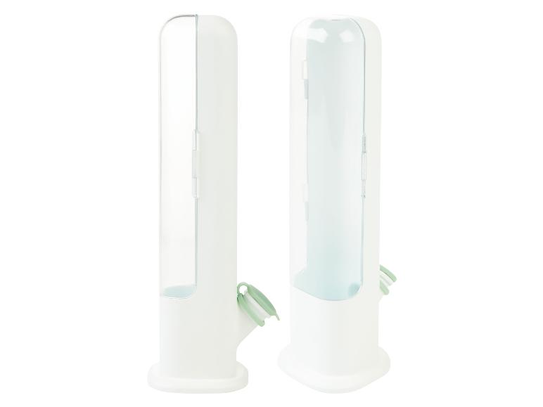 Twee witte dispensers voor plasticfolie en bakpapier.