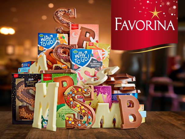 Favorina chocoladeletters en geschenkdozen, waaronder 'Way To Go!' en 'Melk'.