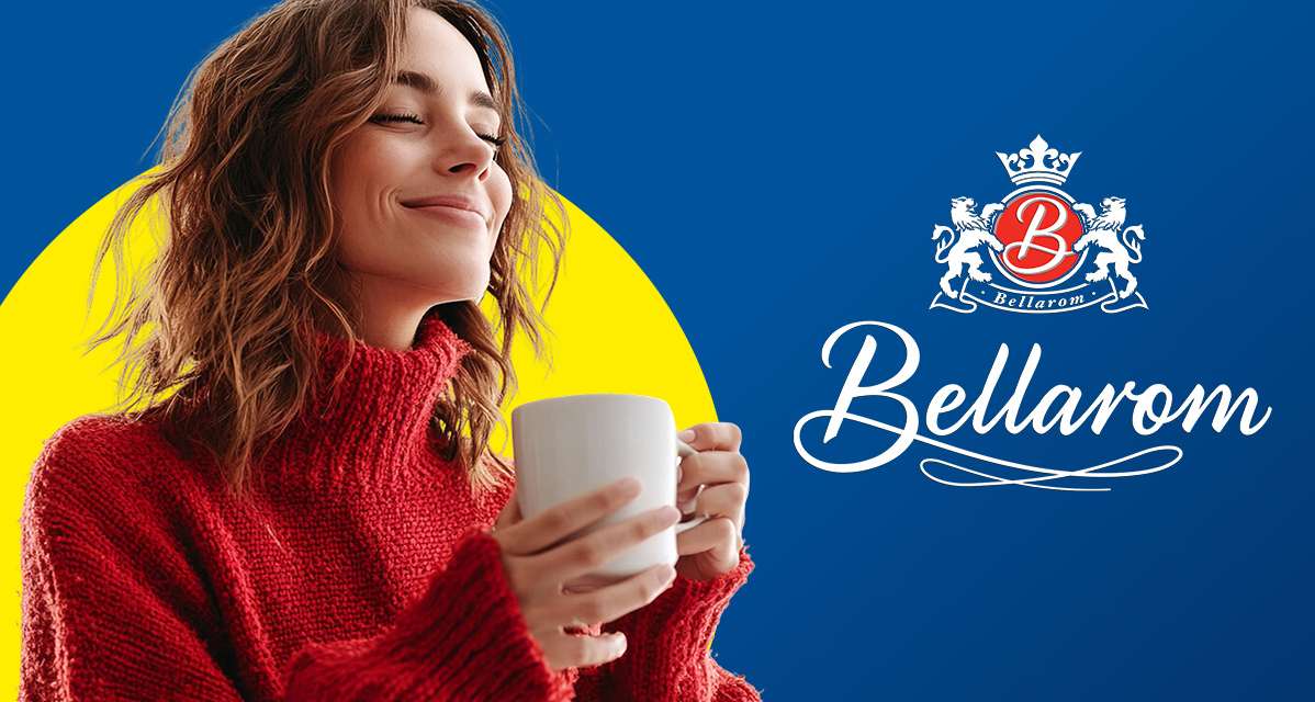 Vrouw geniet van een warme Bellarom drank.