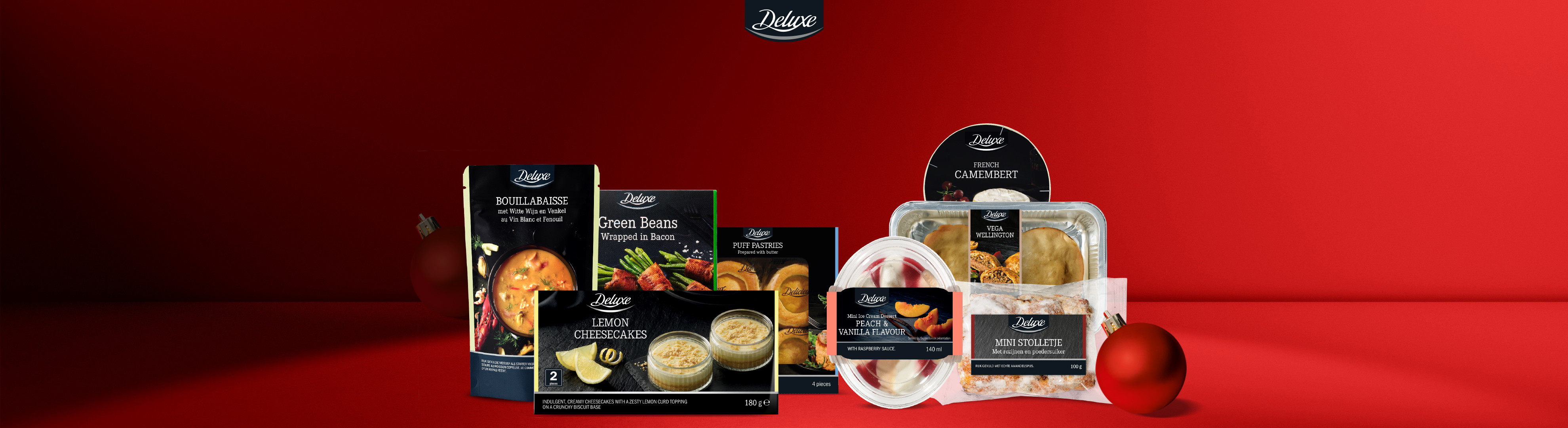 Deluxe feestelijke producten: bouillabaisse, groene bonen, bladerdeeg, cheesecakes, ijs, camembert, Wellington, stolletje.